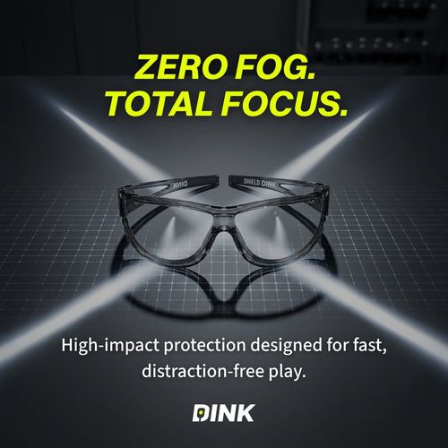 Sunglasses with 'ZERO FOG. TOTAL FOCUS.' text on a dark background with grid pattern, featuring the brand 'DINK'.
